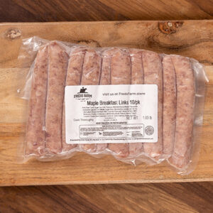 Plastic-wrapped package of maple breakfast sausage links labeled 'Maple Breakfast Links 10/pk' on a wooden cutting board.