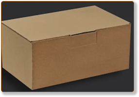 Rectangle 79 - Fred's Farm - Fred's Farm Closed brown cardboard box on a dark surface